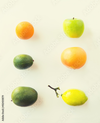 ripe fruits and vegetables over white