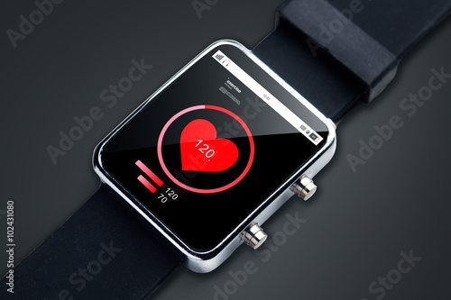 close up of smart watch with pulsometer app photo