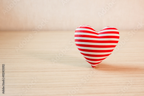 Valentine hearts on wooden background