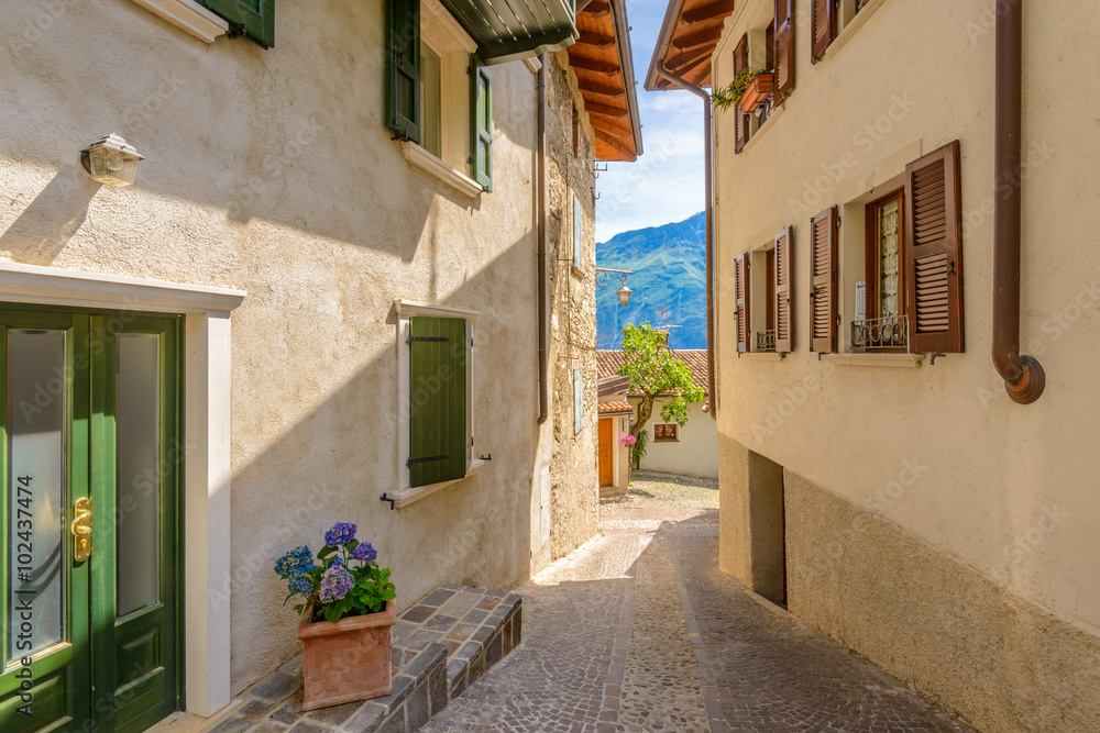 Picturesque small town street view in Limone, Lake Garda Italy.