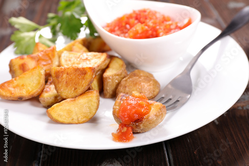 roasted potatoes and spicy tomato sauce