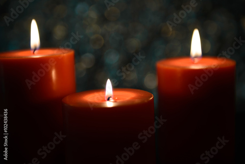 aromatic orange candle, bokeh background