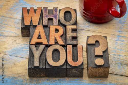 Who are you question in wood type photo