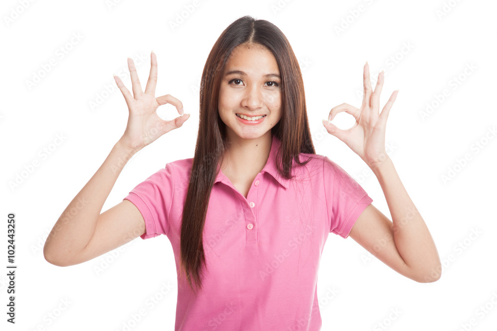 Beautiful Asian girl show two OK sign Beautiful Asian girl show two OK sign