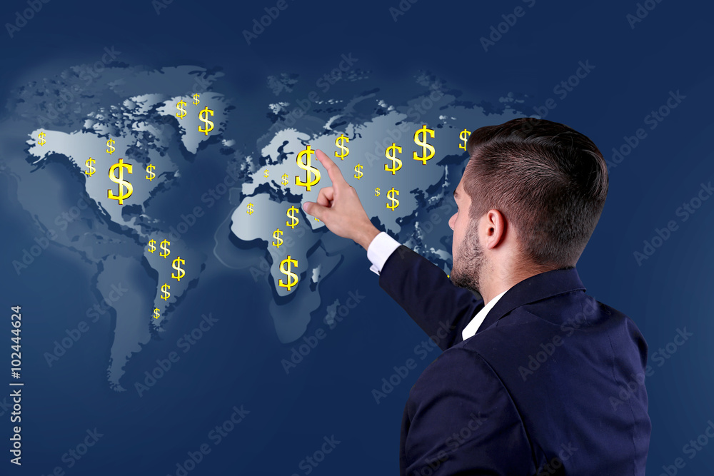 Business success strategy concept. Businessman in suit introduce something on world map background Business success strategy concept. Businessman in suit introduce something on world map background