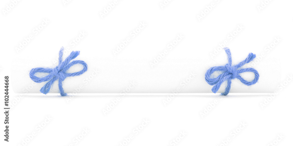 White letter scroll tied with rope, two blue bows isolated White letter scroll tied with rope, two blue bows isolated