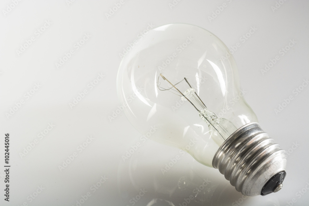 incandescent lightbulb on a white background incandescent lightbulb on a white background