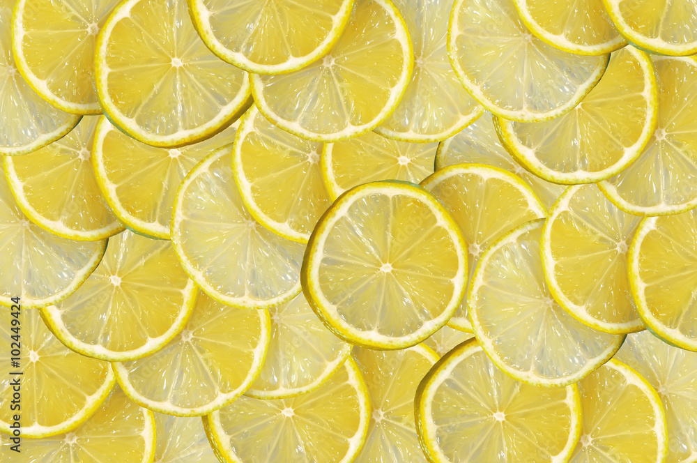 Yellow background with citrus-fruit of lemon slices