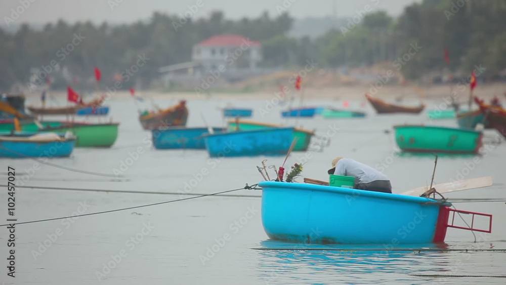 Fishing boats in the bay near the village of Mui Ne