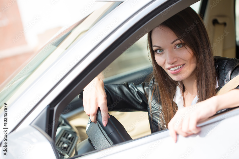 girl near the new car girl near the new car