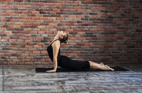 woman practicing yoga 