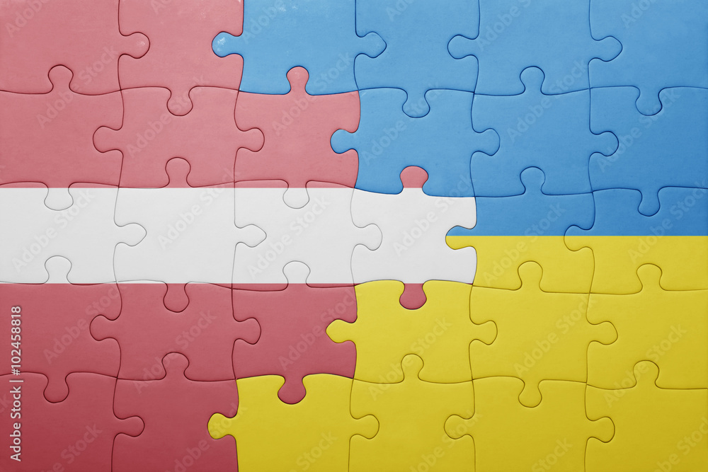puzzle with the national flag of ukraine and latvia puzzle with the national flag of ukraine and latvia