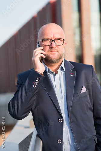 Man using mobile phone. photo