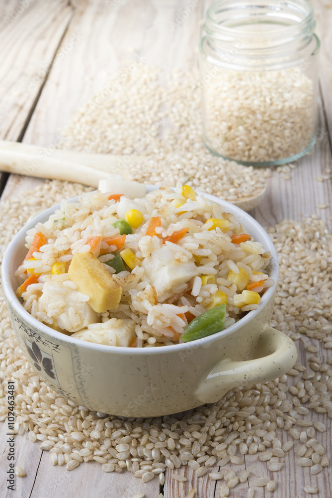 Rice with vegetables on white background Rice with vegetables on white background