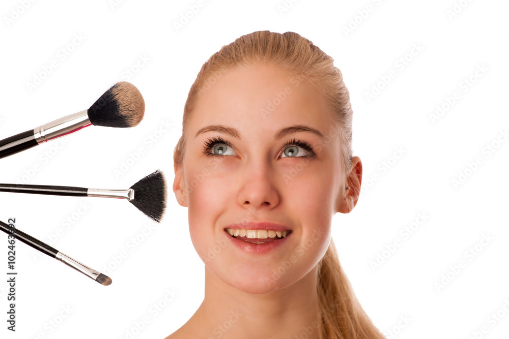 Woman with cosmetics brushes for makeup isolated.