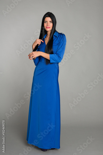 Young woman in a blue dress © Stanislav Komogorov