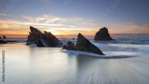 Rochas da praia da Adraga em Sintra photo