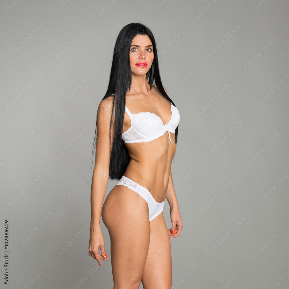 Fototapeta premium Beautiful young woman in white lingerie