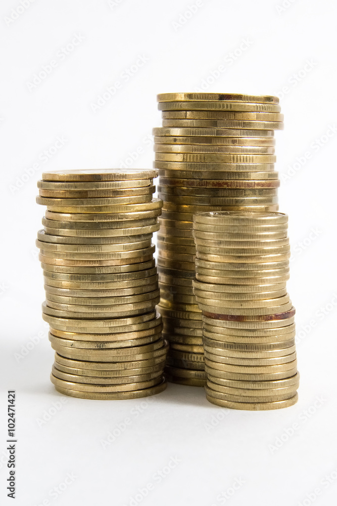 Columns of golden and silver coins isolated on white background. Money concept, investment bank Columns of golden and silver coins isolated on white background. Money concept, investment bank