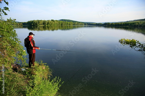 man fishing on the lake.