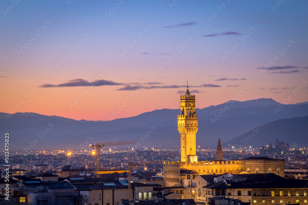 Beautiful evening view after sunset over the panorama of Florence, Tuscany (Italy), with  Palazzo Vecchio (The Old Palace), with a dark vignette