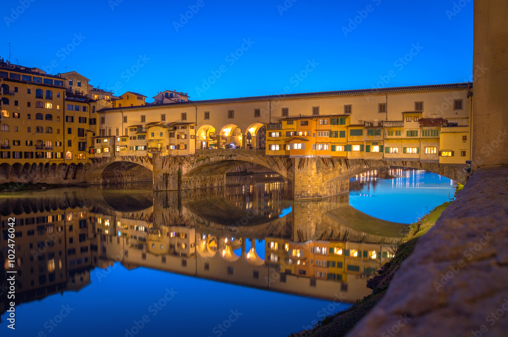 A view of the Old Bridge (Ponte Vecchio) in Florence, over the river Arno