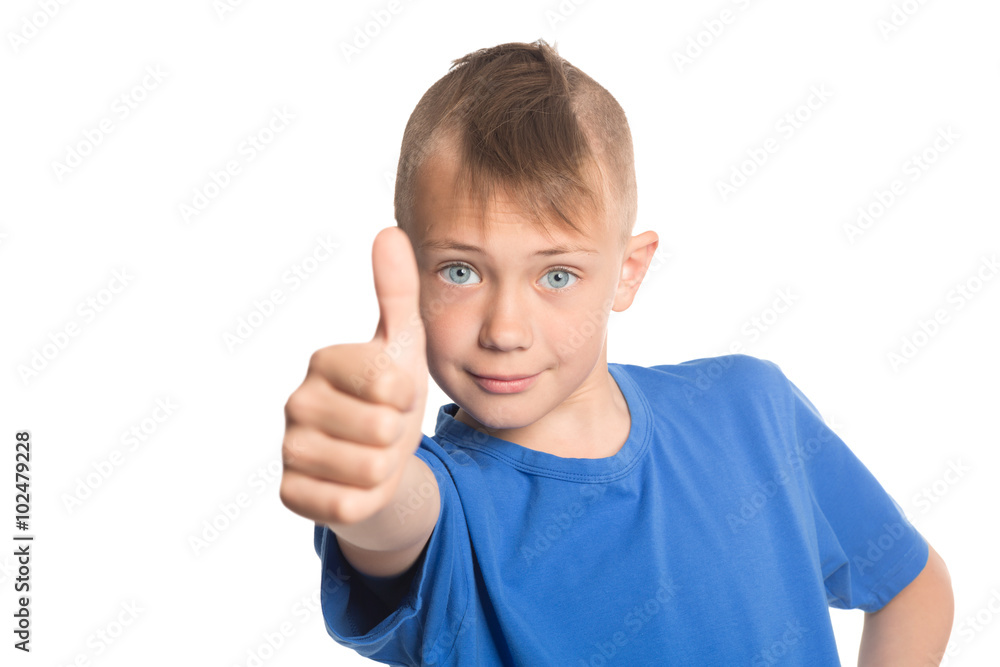 Happy boy showing thumbs up gesture Happy boy showing thumbs up gesture