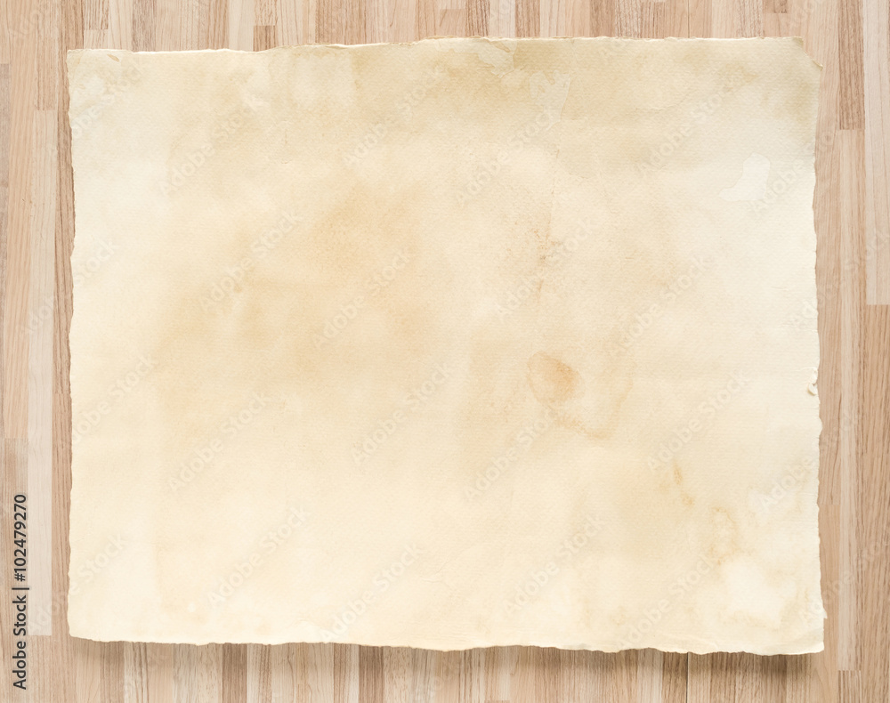 Vintage paper texture on wood background.