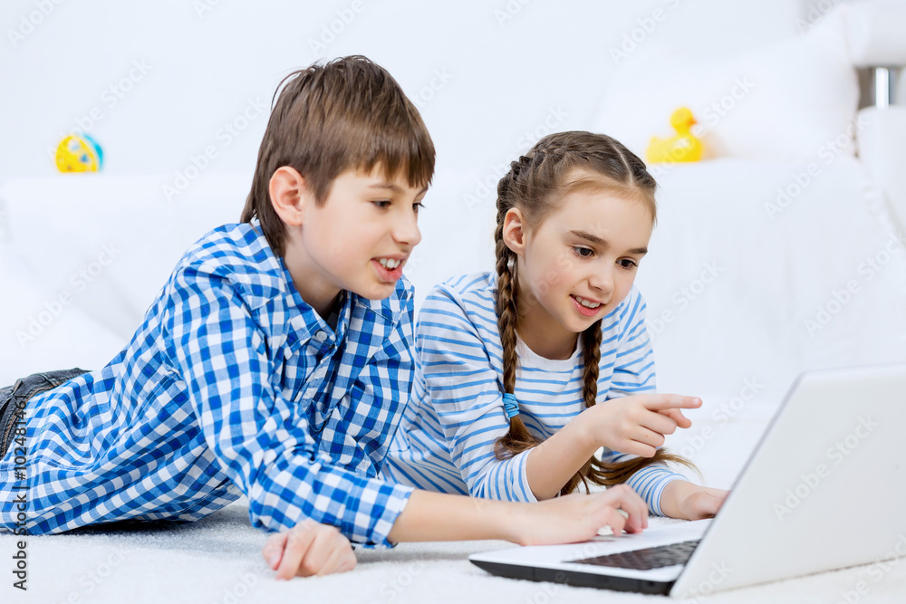 Cute kids using devices Cute kids using devices