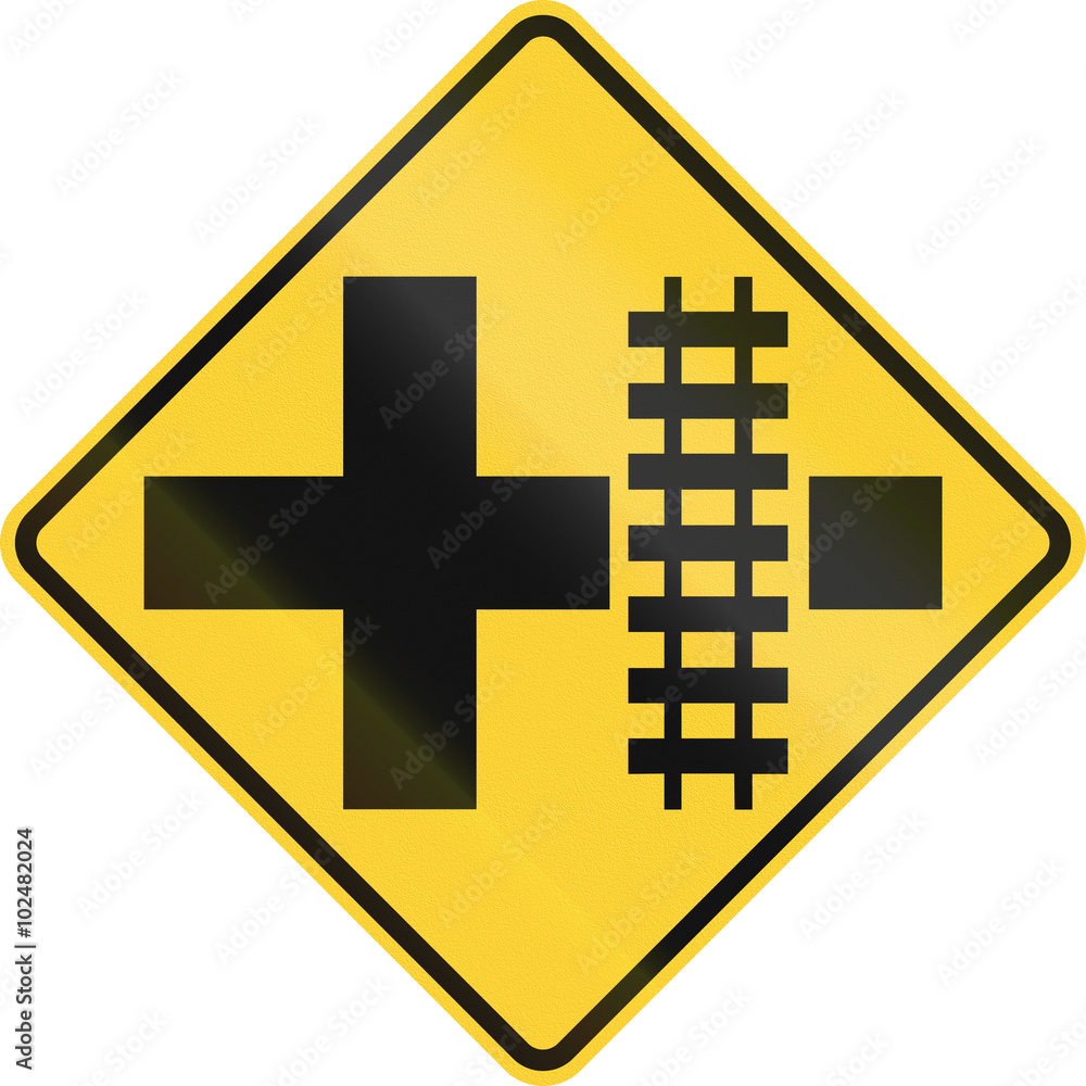 Fototapeta premium United States MUTCD road sign - Level crossing and intersection