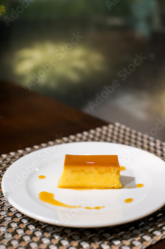 custard on a white plate photo