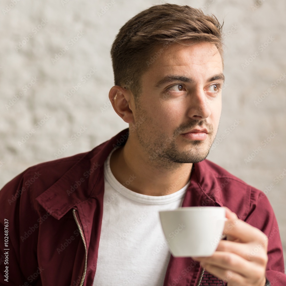 Handsome man drinking coffee Handsome man drinking coffee