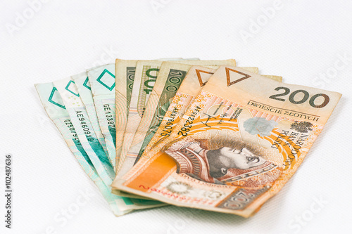 Polish banknotes on a white background