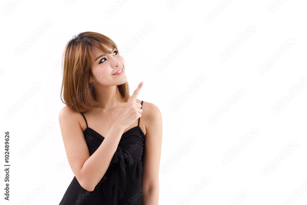 happy, smiling woman pointing up happy, smiling woman pointing up