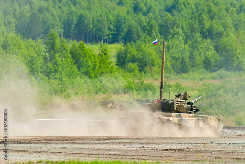 Nizhniy Tagil, Russia - July 12. 2008: T80 tank with equipment for speeding up of water crossing and Terminator Tank Support Fighting Vehicle. Russia Arms Expo exhibition photo