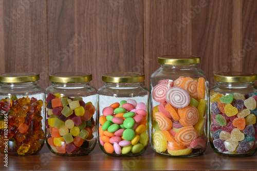 Various sugary candy in a class jar