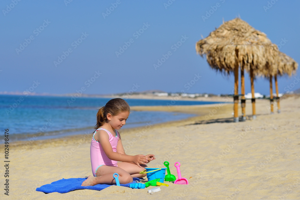 Real toddler girl enjoying her summer vacation