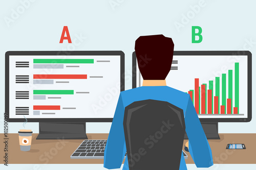 man at workplace with two monitors