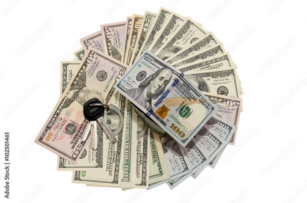 house made from dollar bills with key isolated on white background house made from dollar bills with key isolated on white background