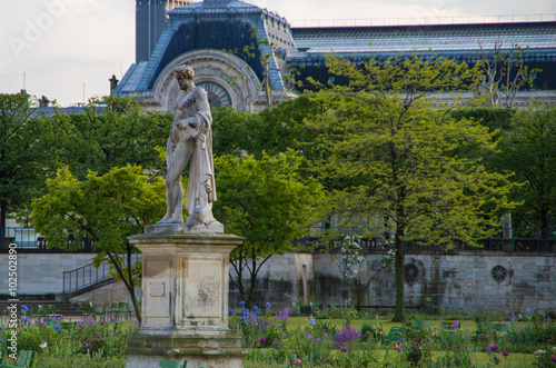 Classical statues adorn the public parks and gardens of Paris, France