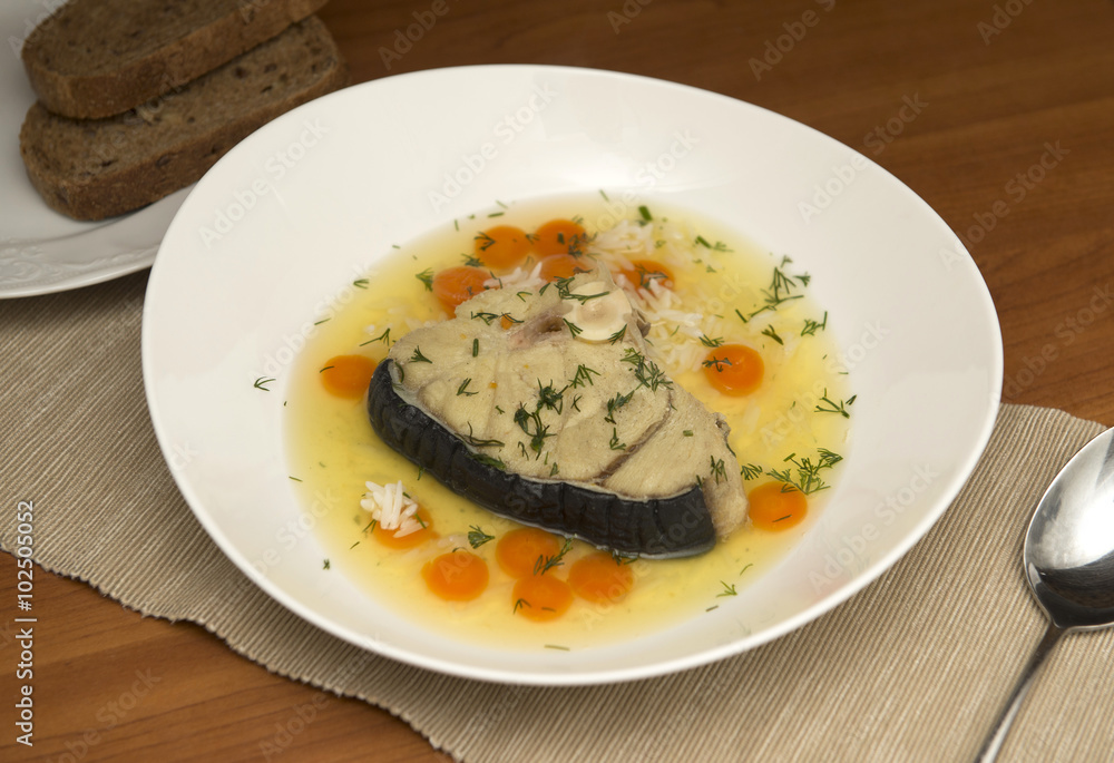 Shark soup in a white plate