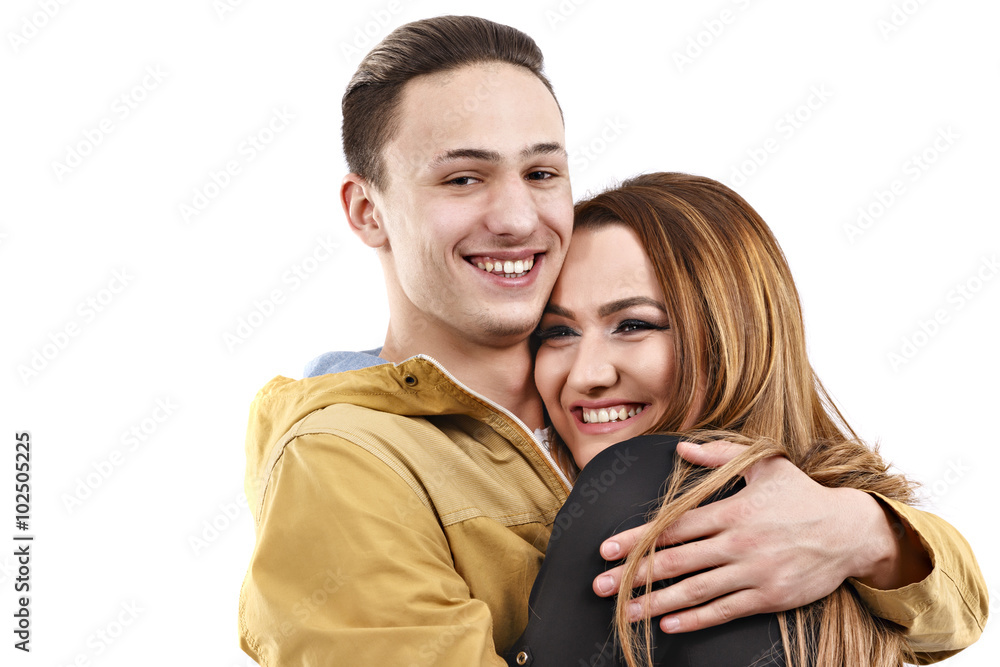 Young man and woman together over white background Young man and woman together over white background