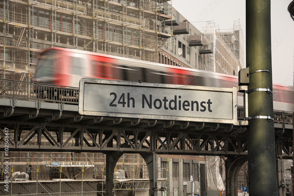 Obraz premium Schild 70 - 24h Notdienst