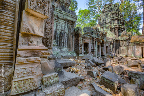 The ruins of the ancient temple Ta Som destroyed by trees in Angkor complex photo