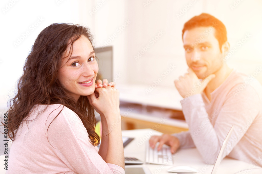 Man working with his co-worker on computer Man working with his co-worker on computer