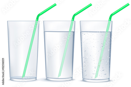 Glass of water with drinking straw. Glass of sparkling water.