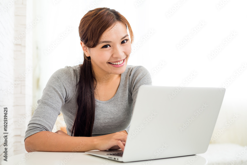 Woman using laptop computer Woman using laptop computer