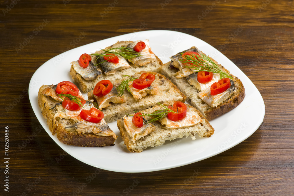 sandwiches with herring, red pepper and dill sandwiches with herring, red pepper and dill
