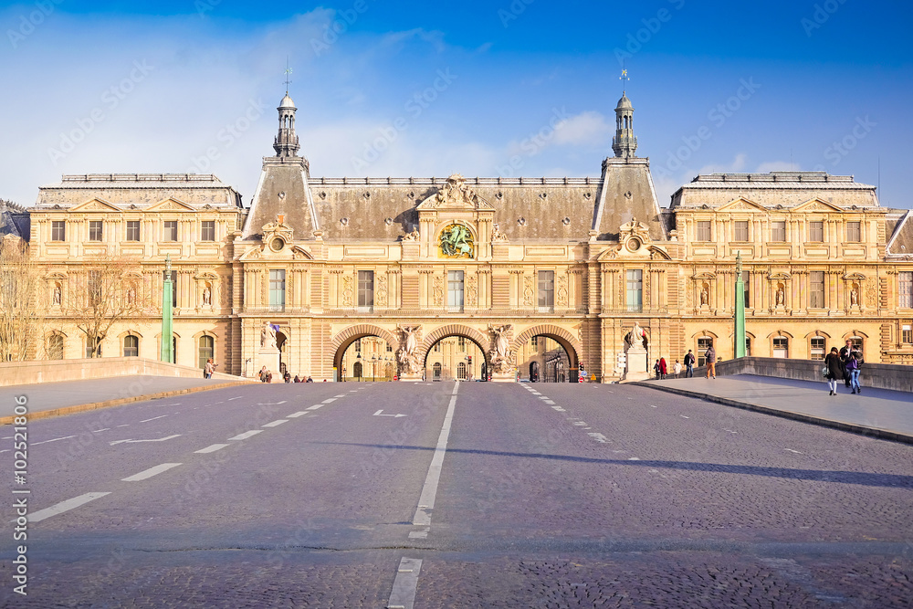 Paris, France, February 6, 2016: exterior of Louvre, the well-known residence of the French kings, nowadays - one of the largest museums of the fine arts in the world, Paris, France