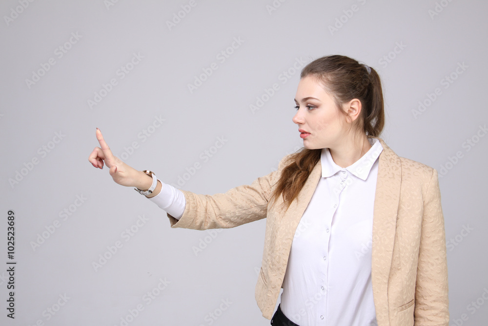 woman presses a virtual button woman presses a virtual button